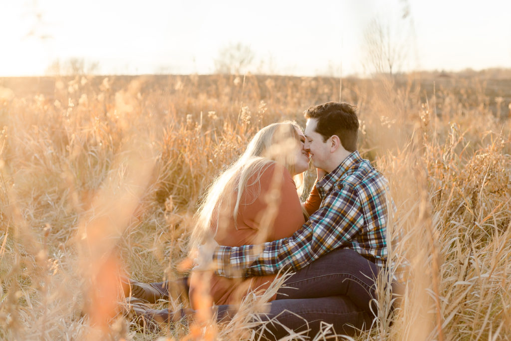 a couple kiss during engagement session