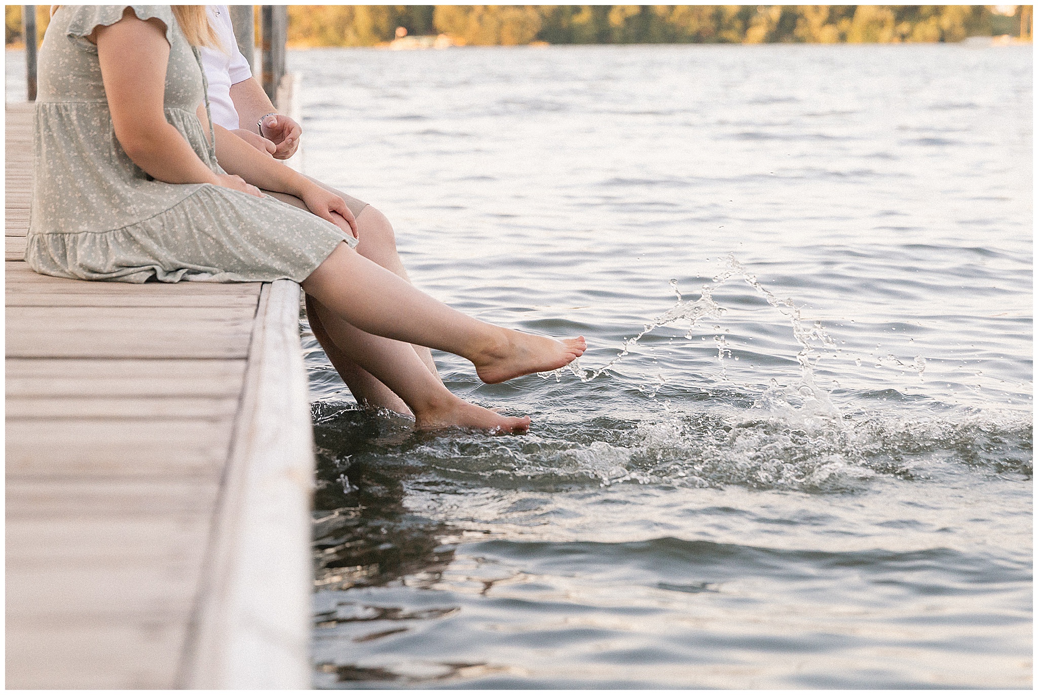 natural light engagement photos at sunset on the lake
